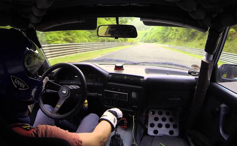 BMW E30 325i racing in the Nürburgring with a Porsche, Subaru, BMW M3, Audi, and more.
